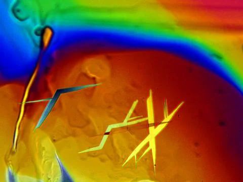 Crystals seen in a microscope, using polarized light Stock Photos