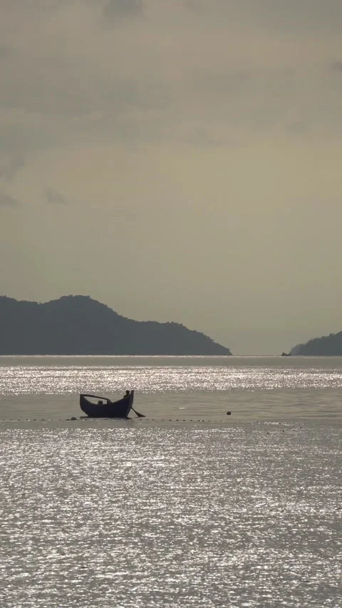 CS - Vertical Video of Sunset and Boat on the Sea Stock Footage 239938806