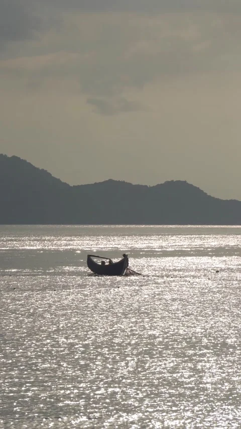CS - Vertical Video of Sunset and Boat on the Sea Stock Footage 239939240