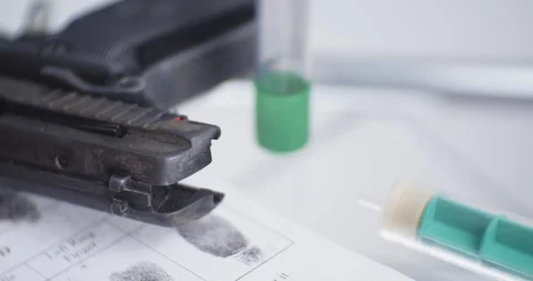 CSI balistic expertise gun close up Stock Footage 119045113