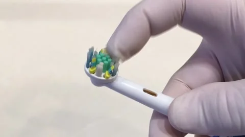 CSI examines toothbrush Stock-Footage 68944989