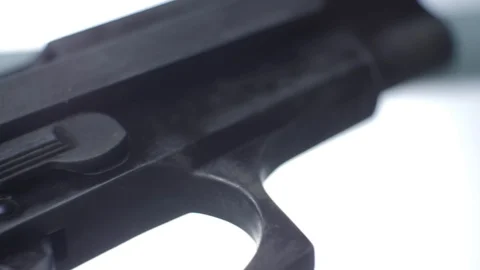 CSI expert table - gun close up Stock Footage 86413246