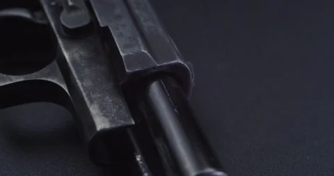 CSI expertise gun on table Stock Footage 231682063