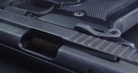 CSI expertise gun on table Stock Footage 231682098