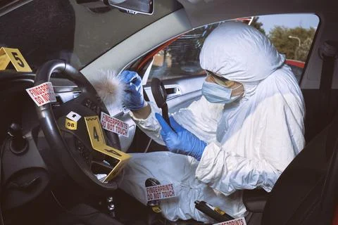 CSI - searching and developing of fingerprints on place of murder in car Stock Photos