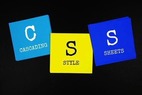 CSS - Cascading Style Sheets acronym text on sticky note on black background Stock Photos