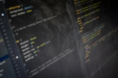 CSS Hello World code on screen blurry background image Stock Photos