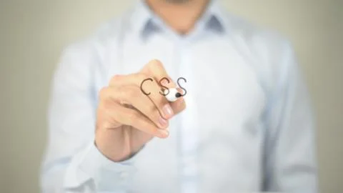 CSS , man writing on transparent screen Foto stock