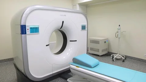 CT scanner. Medical examination using a modern CT scanner in a modern hospital. Stock Footage 318799553