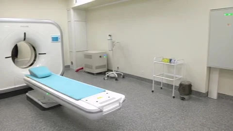 CT scanner. Medical examination using a modern CT scanner in a modern hospital. Stock Footage 318799571
