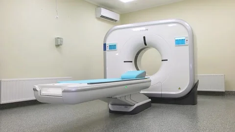 CT scanner. Medical examination using a modern CT scanner in a modern hospital. Stock Footage 318799581