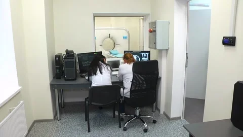 CT scanner. Medical examination using a modern CT scanner in a modern hospital. Stock Footage 318799582
