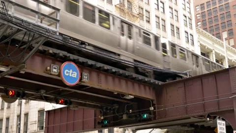 CTA elevated subway train passes overhead Chicago Day 스톡 동영상 226342231