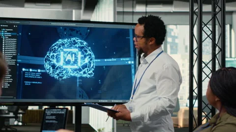 CTO in startup office doing presentation on deep learning tech to investors Stock Footage 323032430