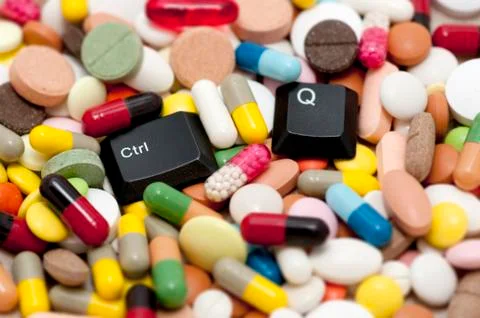 Ctrl and Q keys among drugs (Quit system, quit drugs) Stock Photos