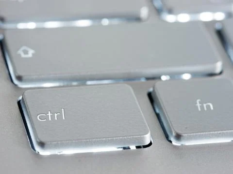Ctrl - Control key on silver laptop keyboard Stock Photos