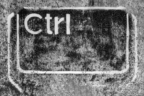 Ctrl key grunge graffiti Ctrl key grungy graffiti. Ideal for creative back... Stock Photos
