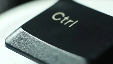 The ctrl key melts and rotates in macro Stock Footage 99377423