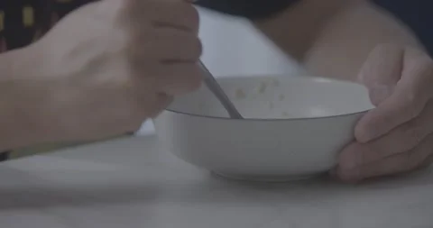 CU 2 Eating Breakfast Asian Man Hungover Stock Footage 196849500