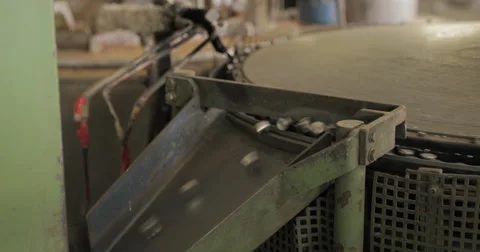 CU and Push In Shot of Lead Pigs Being Cast and Exiting Casting Machine (4K) Stock Footage 60765696