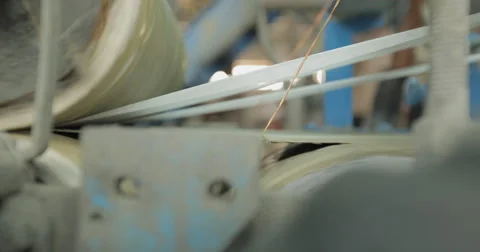 CU and Shallow Focus Shot of a Lead Sheet Passing Through a Roller (4K) Video stock 60762049