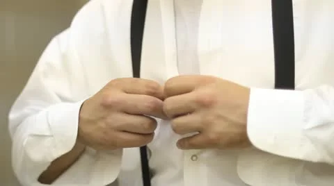 CU Atatching Buttons to Tuxedo Shirt Vidéo 11848281