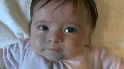 CU OF A BABY LYING DOWN Stock Footage 542981