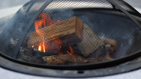 CU barbecue grill, slow motion, burning fire flame, BBQ cooking outdoors Stock Footage 201683895