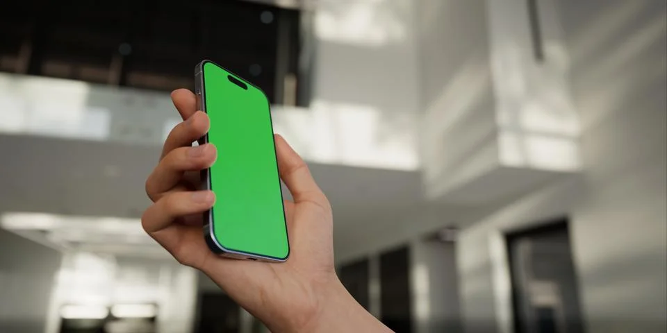 CU Caucasian man using his phone at home, daytime shot Foto stock