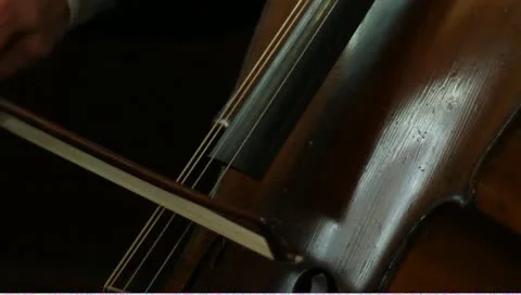 CU Cello being played bow across strings with audio Stock Footage 11139823