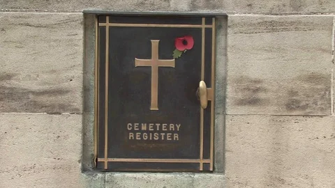 CU Cemetery Register Plaque and Poppy Flower at Essex Farm Cemetery in Belgium Stock-Footage 97792723