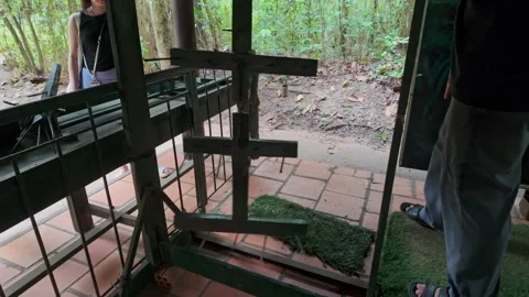 Cu Chi Tunnels, Ho Chi Minh City, Vietnam - Booby trap display Stock Footage 335050484