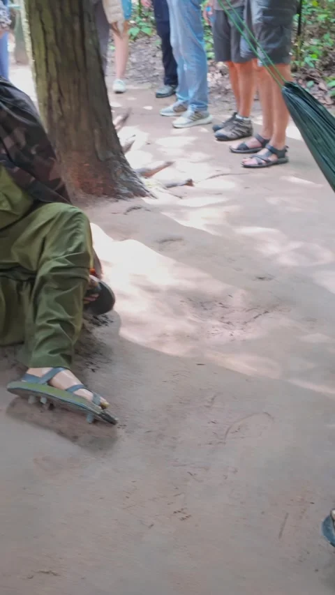 Cu Chi Tunnels, Vietnam - Reenactment of Viet Cong soldiers resting Stock Footage 335050916