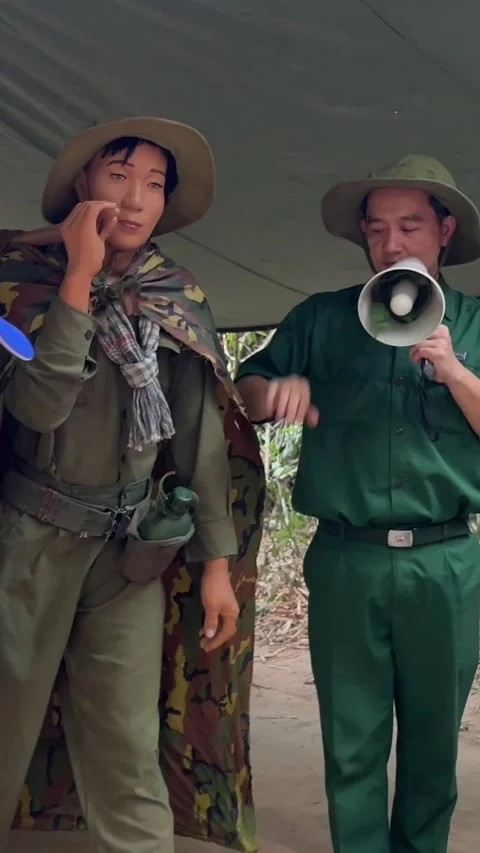Cu Chi, Viet Nam Cu Chi 06.06.2024 excursion group tourists tunnels were the Stock Footage 277411658