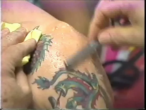CU Cleaning off shoulder for tattoo Stock Footage 69715188