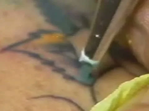 CU Coloring in Flower Tattoo on Shoulder 2 Stock Footage 10849232