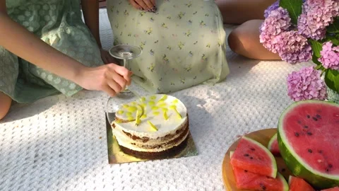 CU of cutting a cake with a glass Hack For Cutting Cake Using Only Wine Glasses Stock Footage 158886771