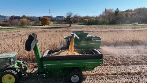 CU drone with loading tractor  Stock Footage 244265784