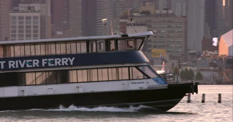 CU of East River Ferry moving along water in slow motion Stock Footage 67291946