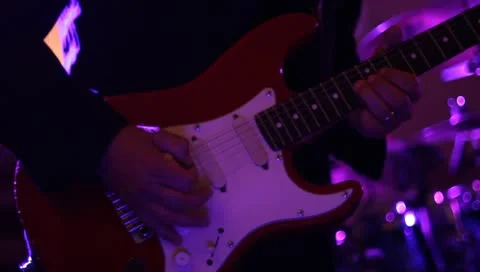 CU electric guitar playing in low lighting live band Vídeos de archivo 11139876
