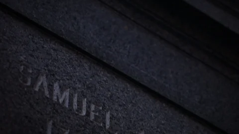 CU Engraving on Base of Sam Adams Statue, Faneuil Hall, Boston, MA Stock Footage 127260346
