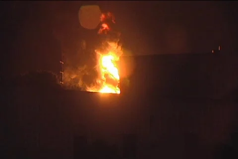 CU Explosive Fire From Behind Building 動画素材 857517