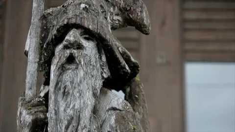 CU face and staff of carved statue of Tolkien's Gandalf the wizard Stock Footage 86757535