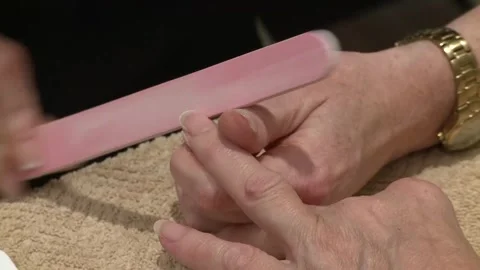 CU female hands getting manicure file Video stock 297480480