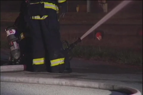 CU Firemen Finish Hosing Ash 動画素材 852164