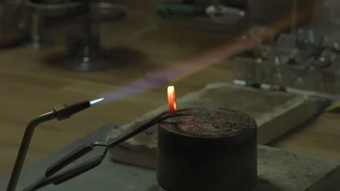 CU flames burning a ring making it glow red Stock Footage 253304991