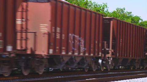 CU freight train moving on tracks Stock Footage 59563571