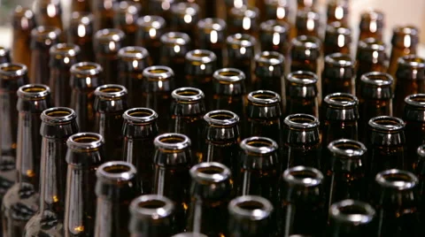 CU full frame bottles headed down assembly line in local brewery SOT 1289 Stock Footage