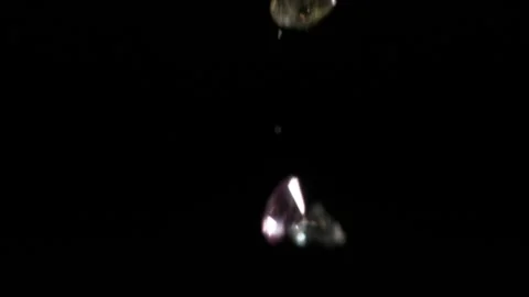 CU Gemstones falling past camera in Slow Motion HD 4 Stock Footage 253059993