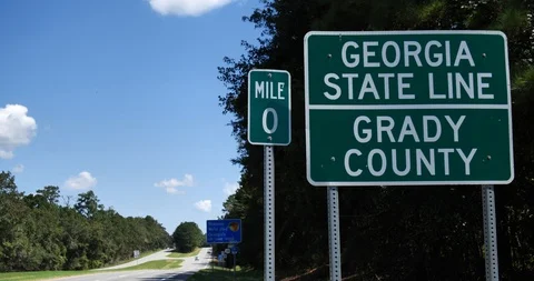 CU Georgia state line, Grady county southern border sign, mile zero Stock Footage 118271131